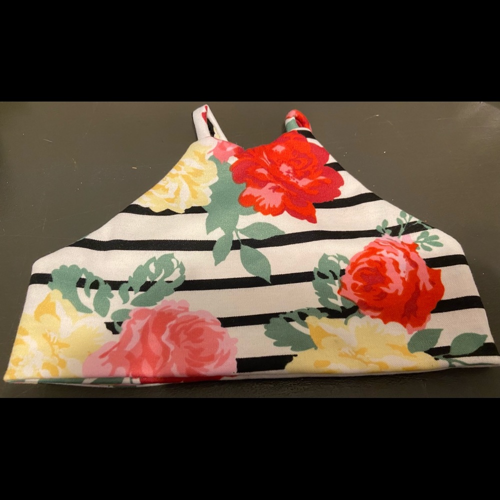 Little girls floral halter top with matching bummies and a bow.